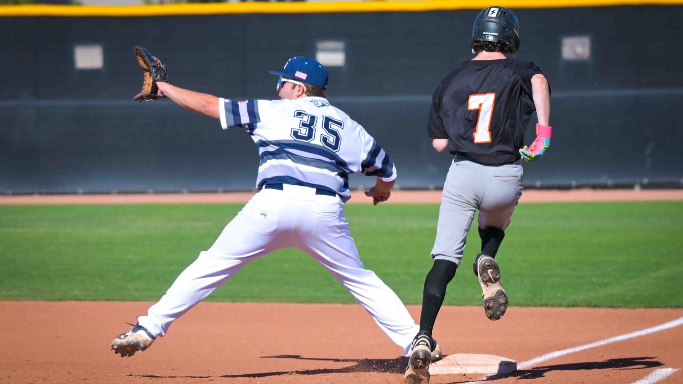 Cole Judge stretching for the out at first base